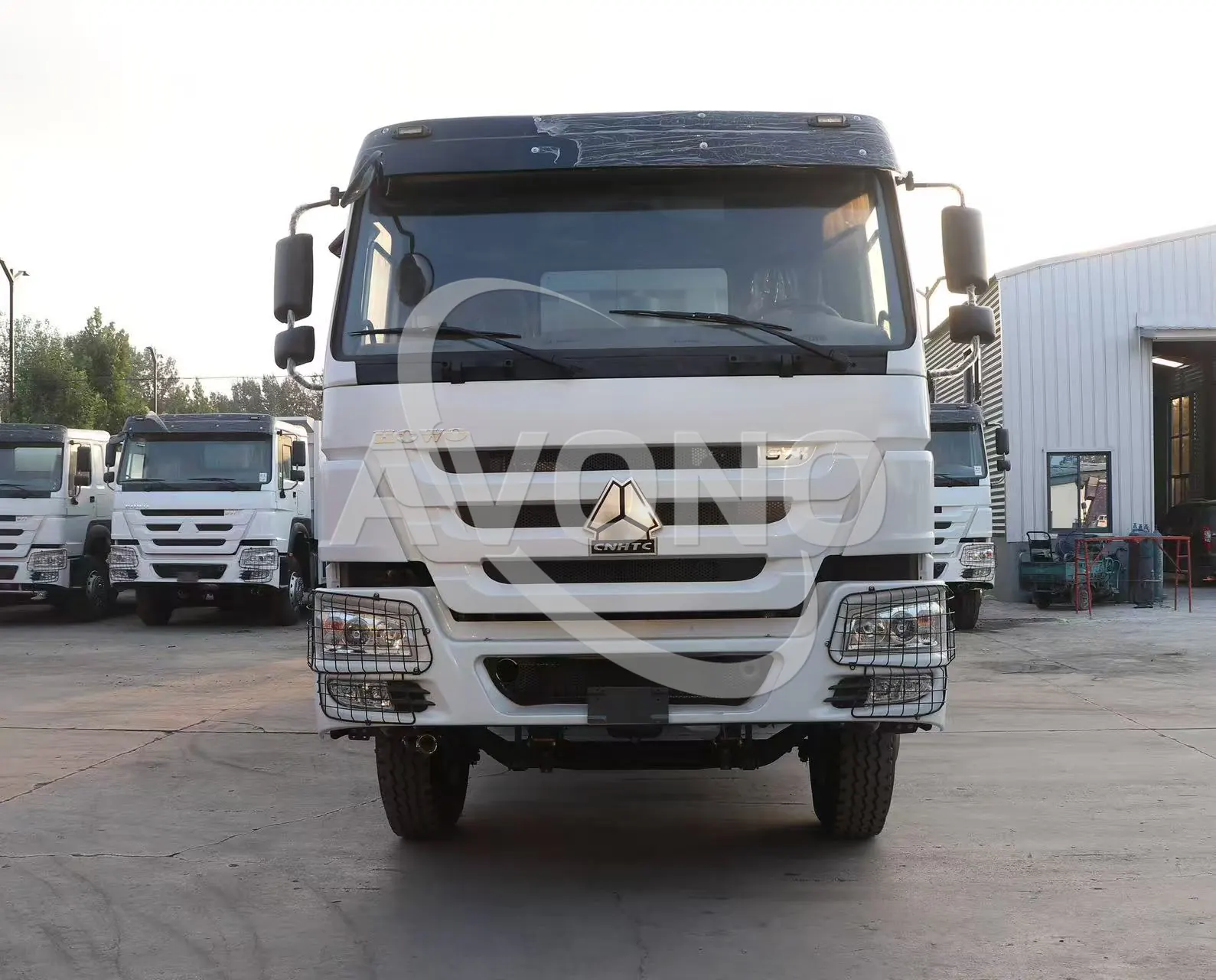 Close-up of the new front grille, headlights and bumper of a refurbished HOWO truck